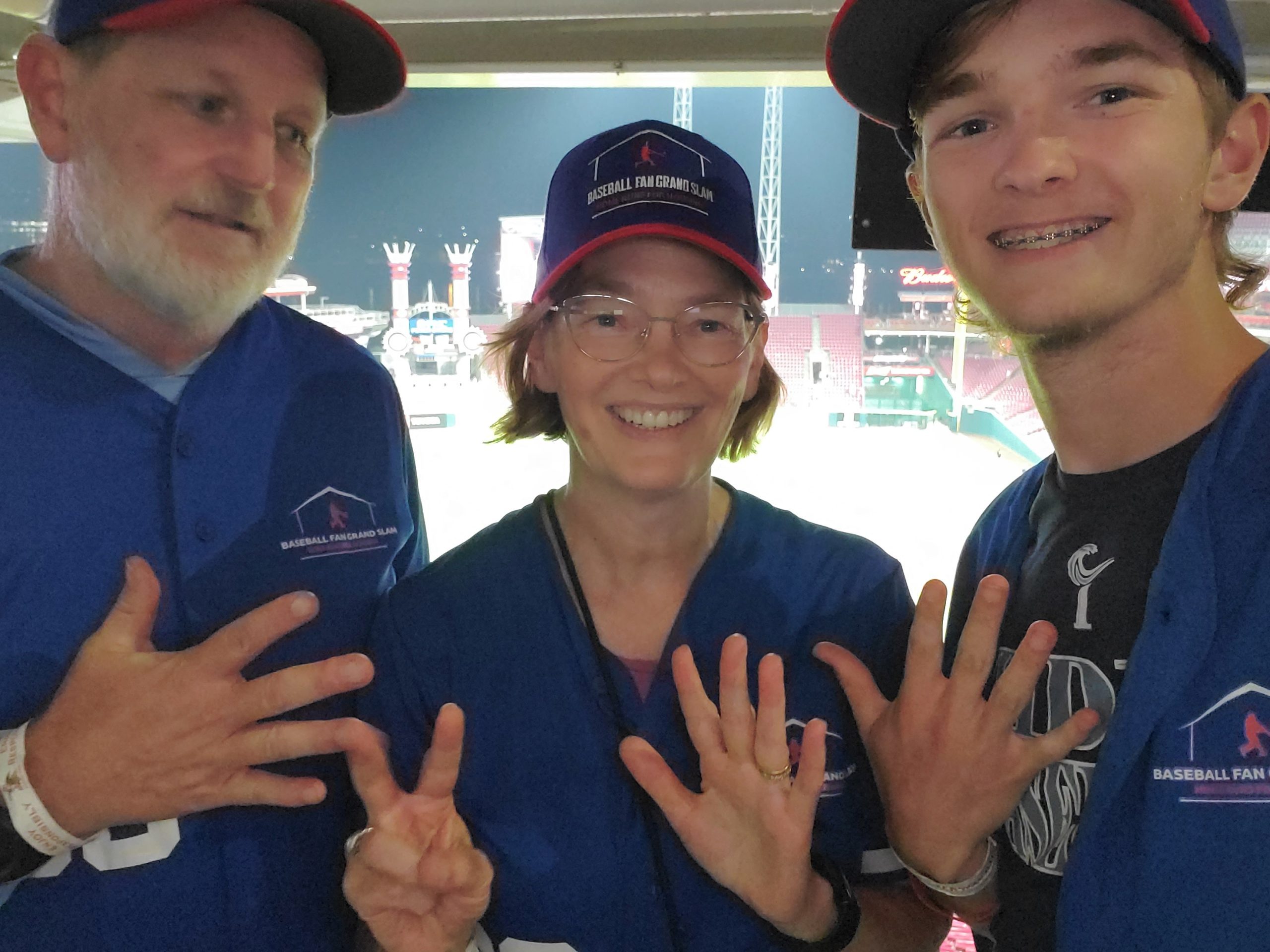 Brad, Heather & Ryan with 17 fingers representing the 17th stadium.