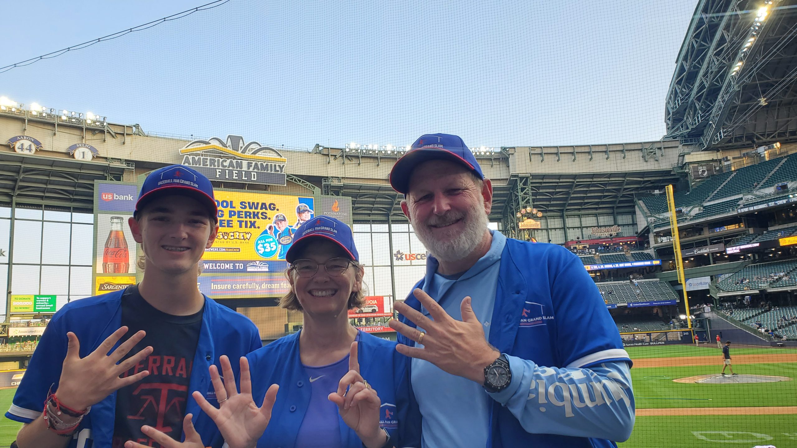 Heather, Brad and Ryan at American Family Field in Milwaukee, holding up 21 fingers!